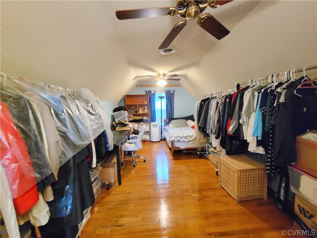 5814 Laurel Trail Road Midlothian, VA 23112 - Photo 28 of 34 a view of walk in closet with clothes and shoes