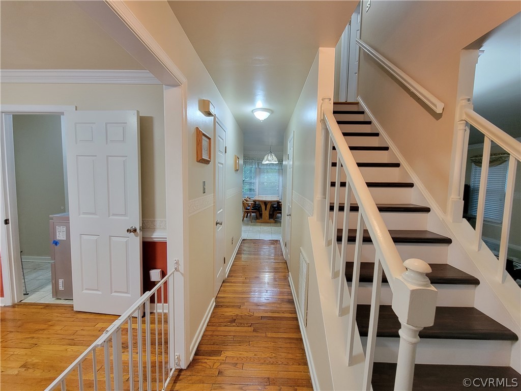 5814 Laurel Trail Road Midlothian, VA 23112 - Photo 3 of 34 a view of a hallway with wooden floor and entryway
