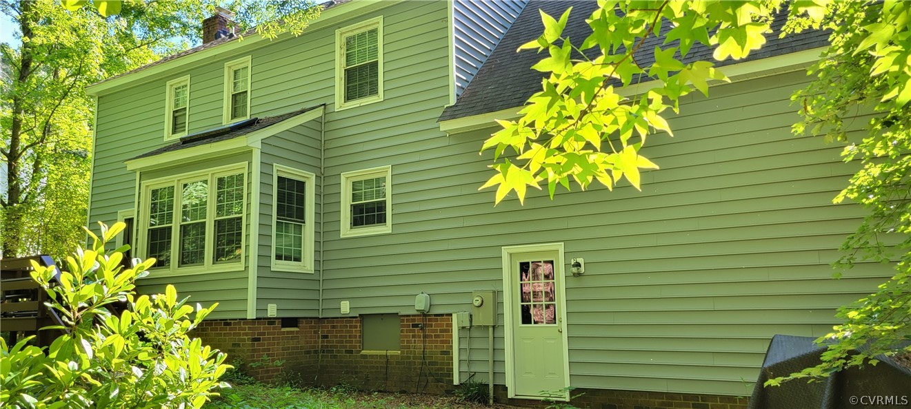 5814 Laurel Trail Road Midlothian, VA 23112 - Photo 32 of 34 a green plant in front of a house