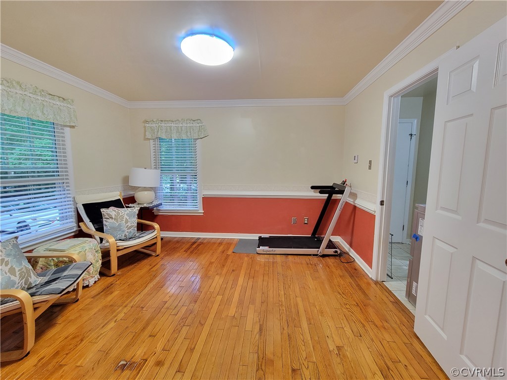 5814 Laurel Trail Road Midlothian, VA 23112 - Photo 8 of 34 a living room with furniture and a wooden floor