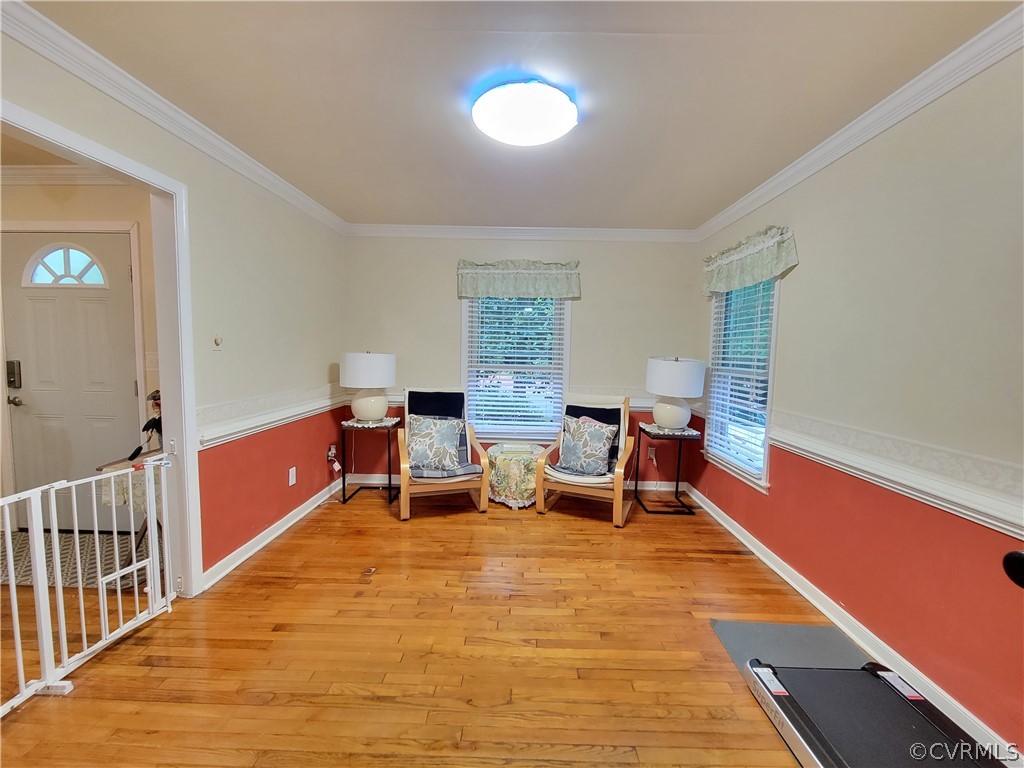 5814 Laurel Trail Road Midlothian, VA 23112 - Photo 10 of 34 a living room with furniture and a wooden floor