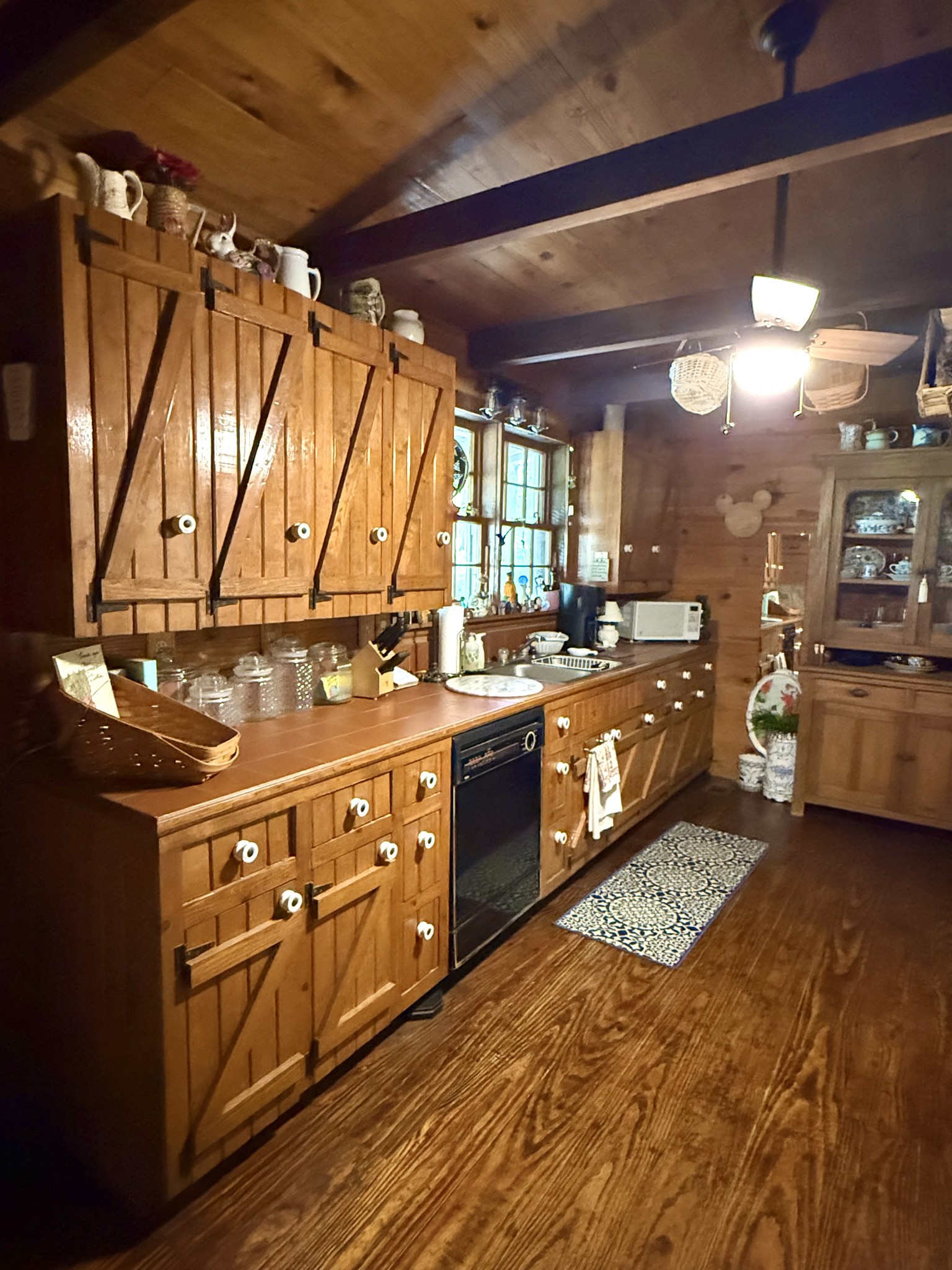 562 Junus Jackson Hollow Road Minor Hill, TN 38473 - Photo 52 of 72 a large kitchen with stainless steel appliances granite countertop a stove a sink and a refrigerator