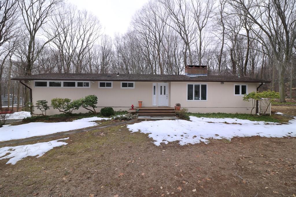 52 Milan Road Woodbridge, CT 06525 - Photo 1 of 1 front view of a house with a yard