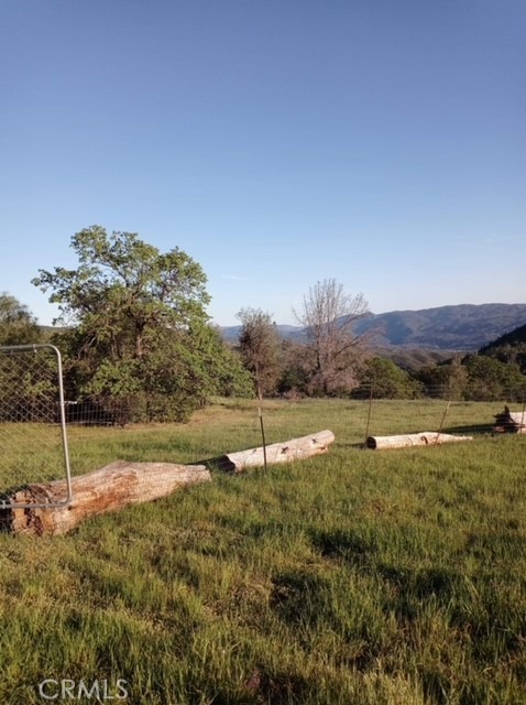 552 Watertrough Road Clearlake Oaks, CA 95423 - Photo 20 of 24 a swimming pool with trees in the background