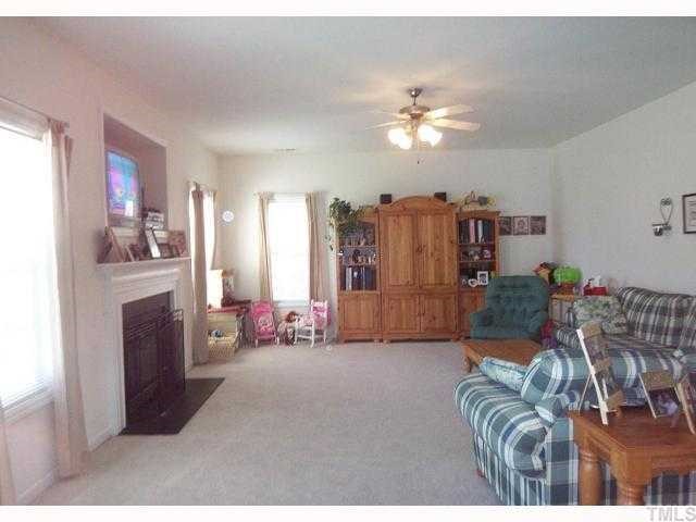 6028 Brambleberry Way Raleigh, NC 27616 - Photo 2 of 12 Huge Great Room with plenty of room for your family and your guests. Gas fireplace with nook for large TV is perfect for entertaining.