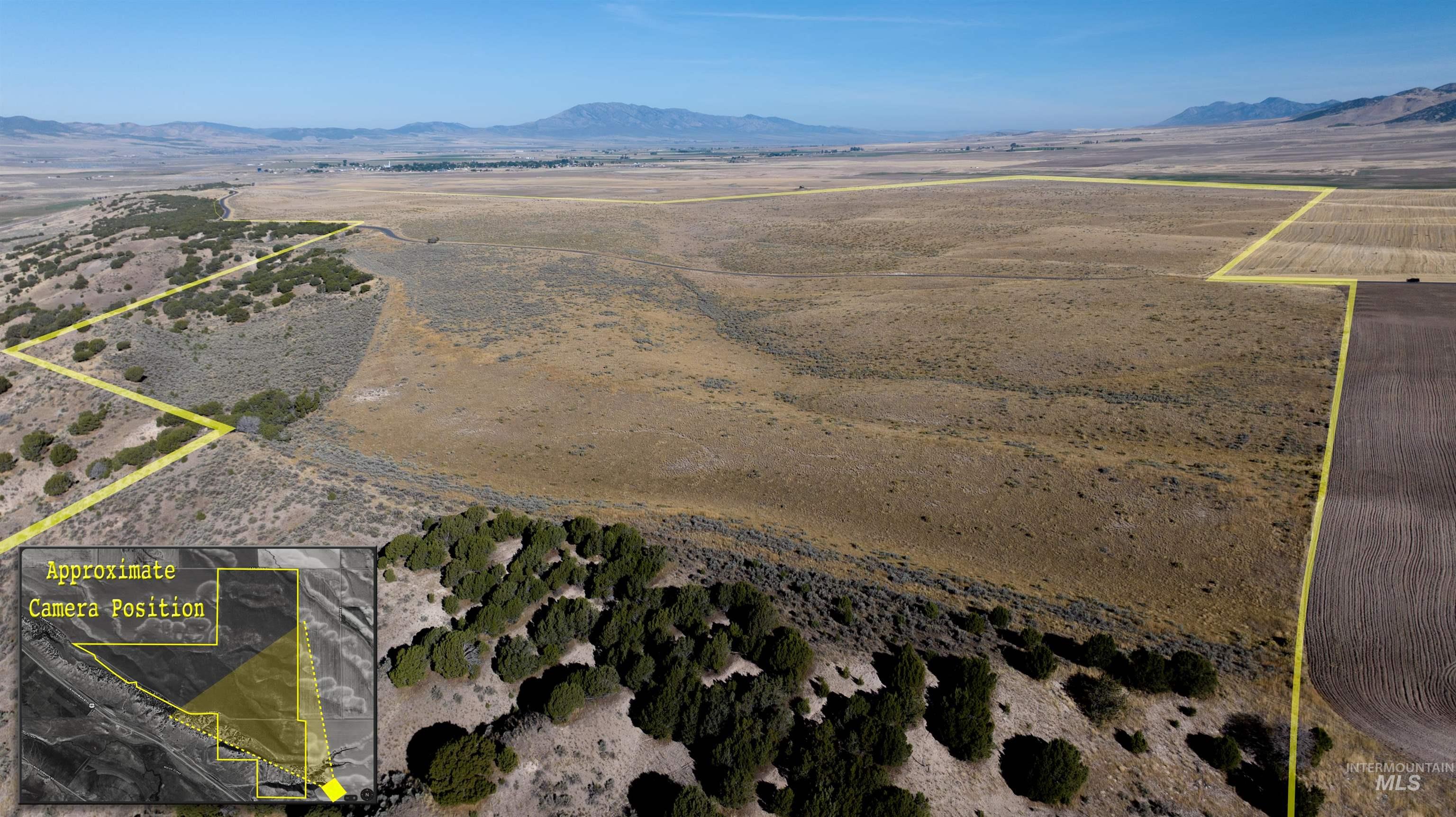 Tbd Southeast Salveson Road Downey, ID 83234 - Photo 3 of 18 Aerial view of sparsely populated area featuring mountains and property parcel outlined