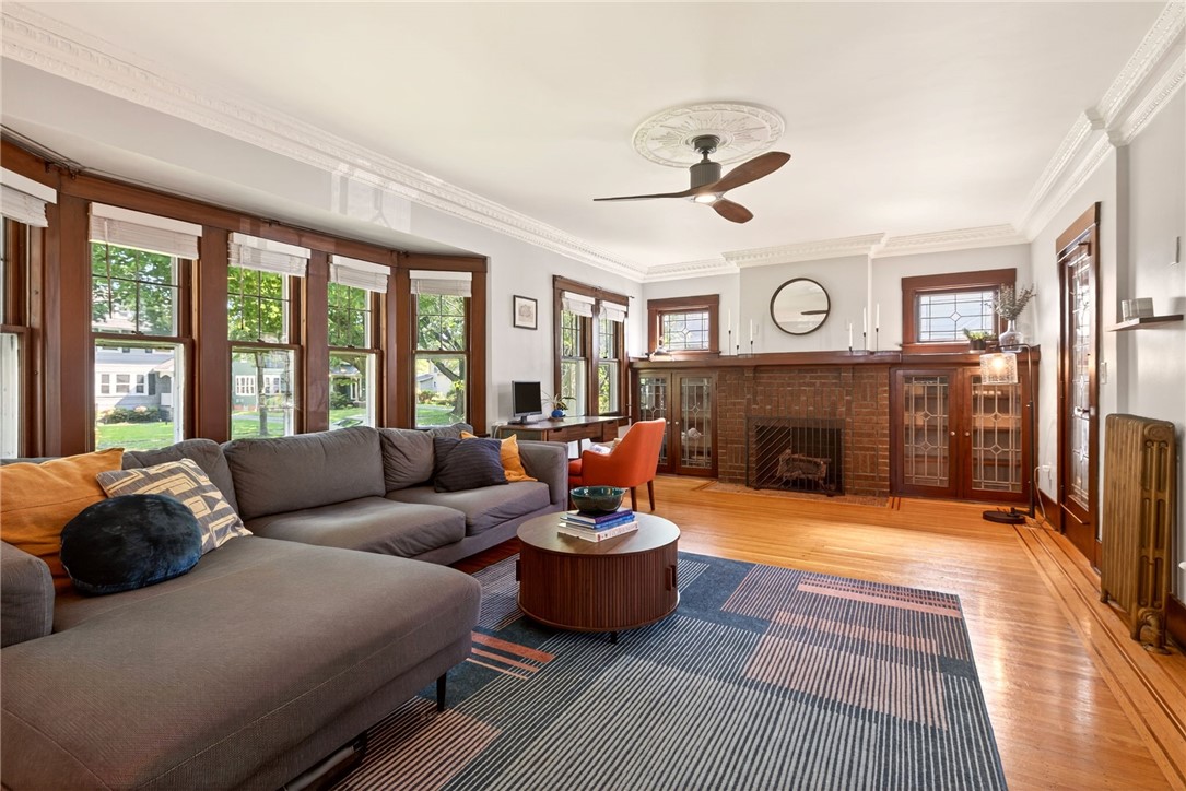 29 Elmcroft Road Rochester, NY 14609 - Photo 6 of 42 Wall of windows allows for natural light.
