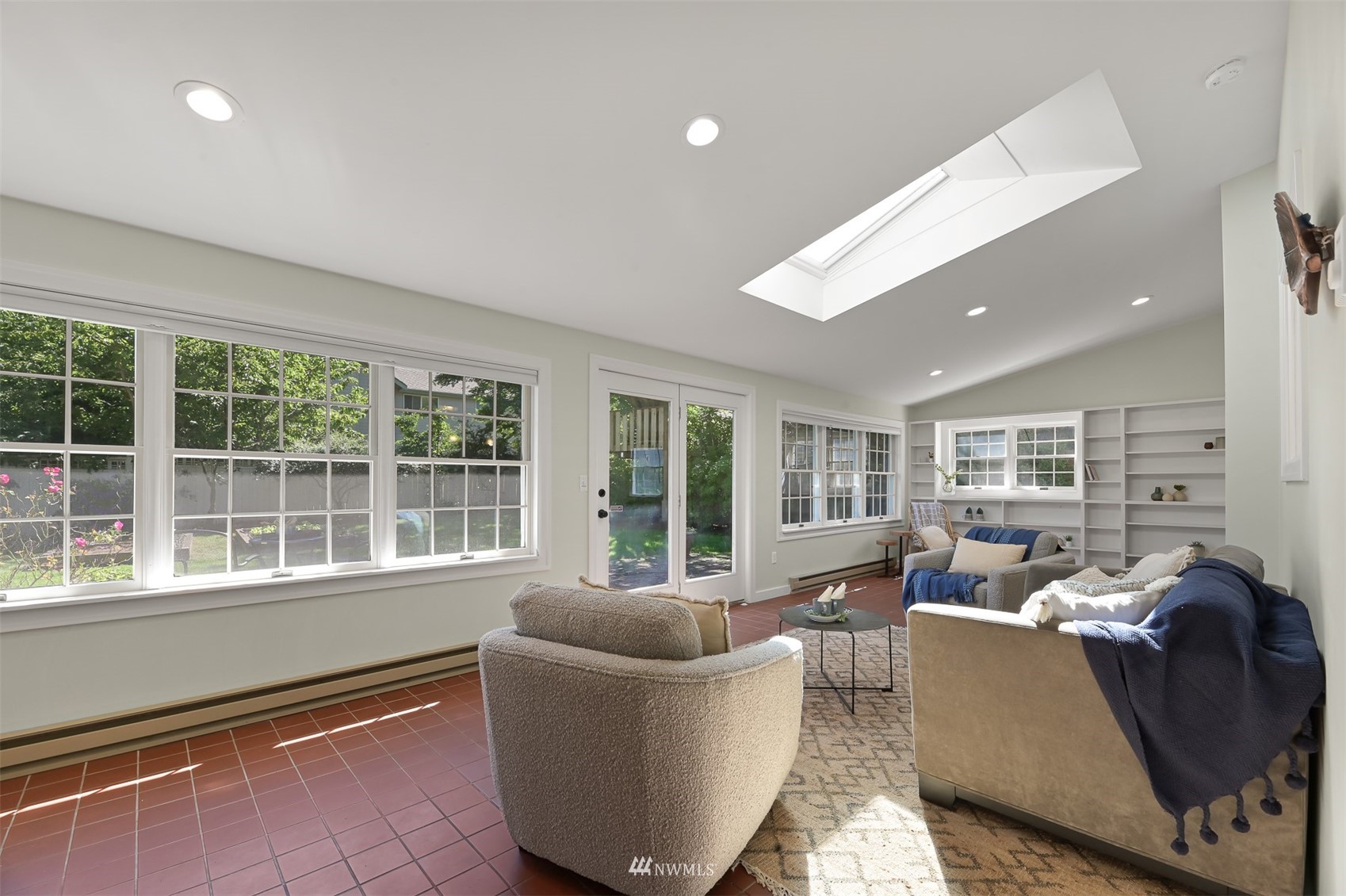 622 Everglade Road Bellingham, WA 98225 - Photo 12 of 38 a living room with furniture and large windows