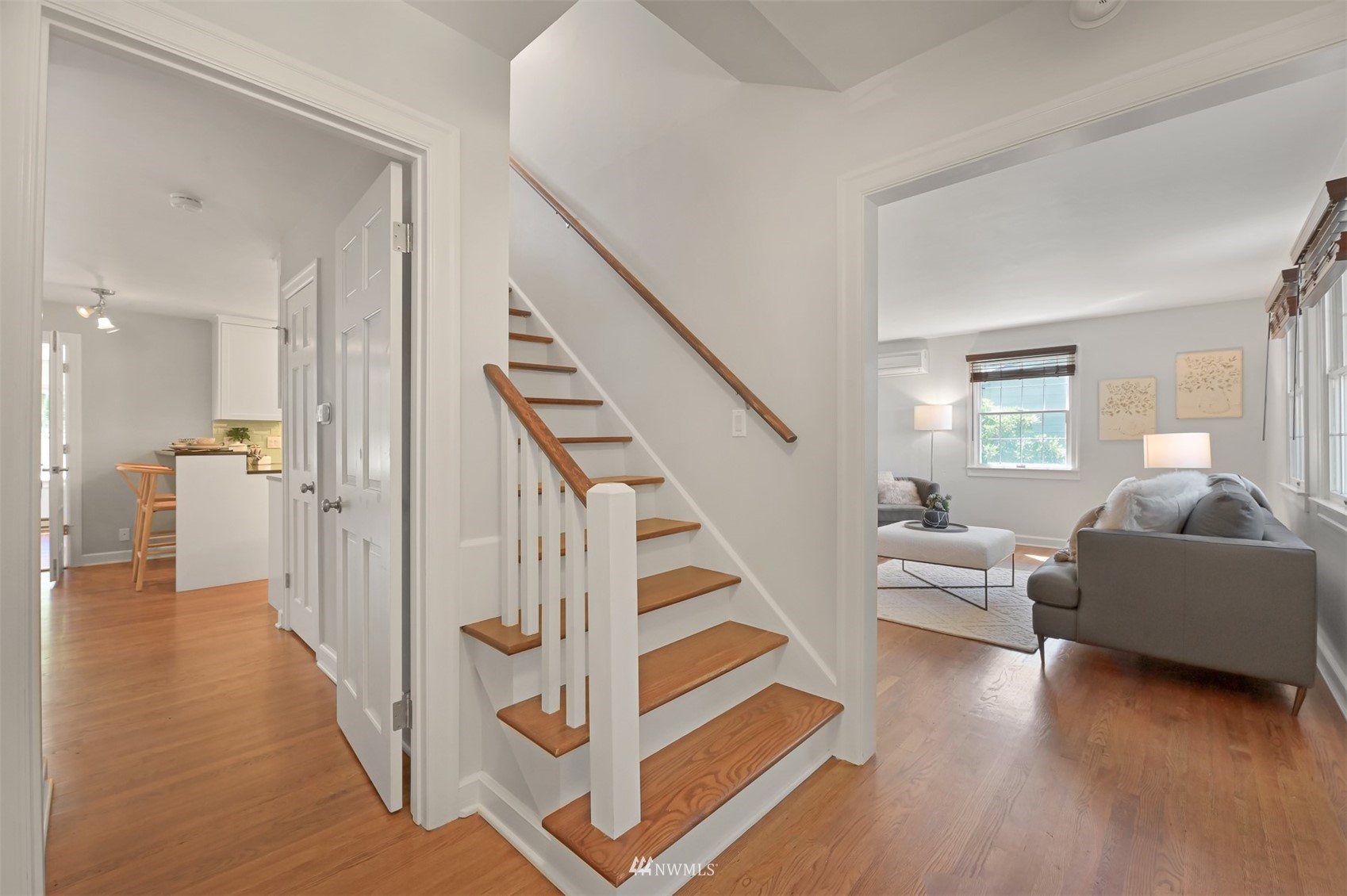 622 Everglade Road Bellingham, WA 98225 - Photo 15 of 38 a view of a livingroom with furniture wooden floor and windows