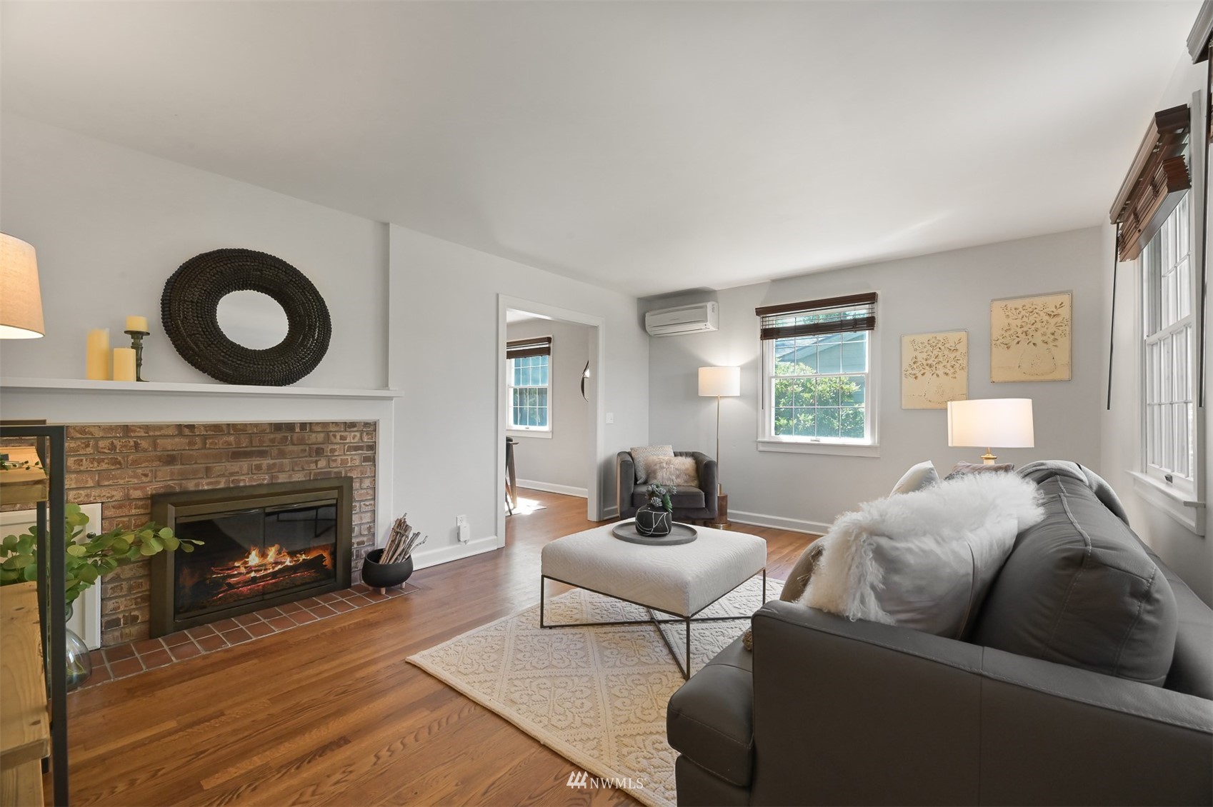 622 Everglade Road Bellingham, WA 98225 - Photo 2 of 38 a living room with furniture a fireplace and a window