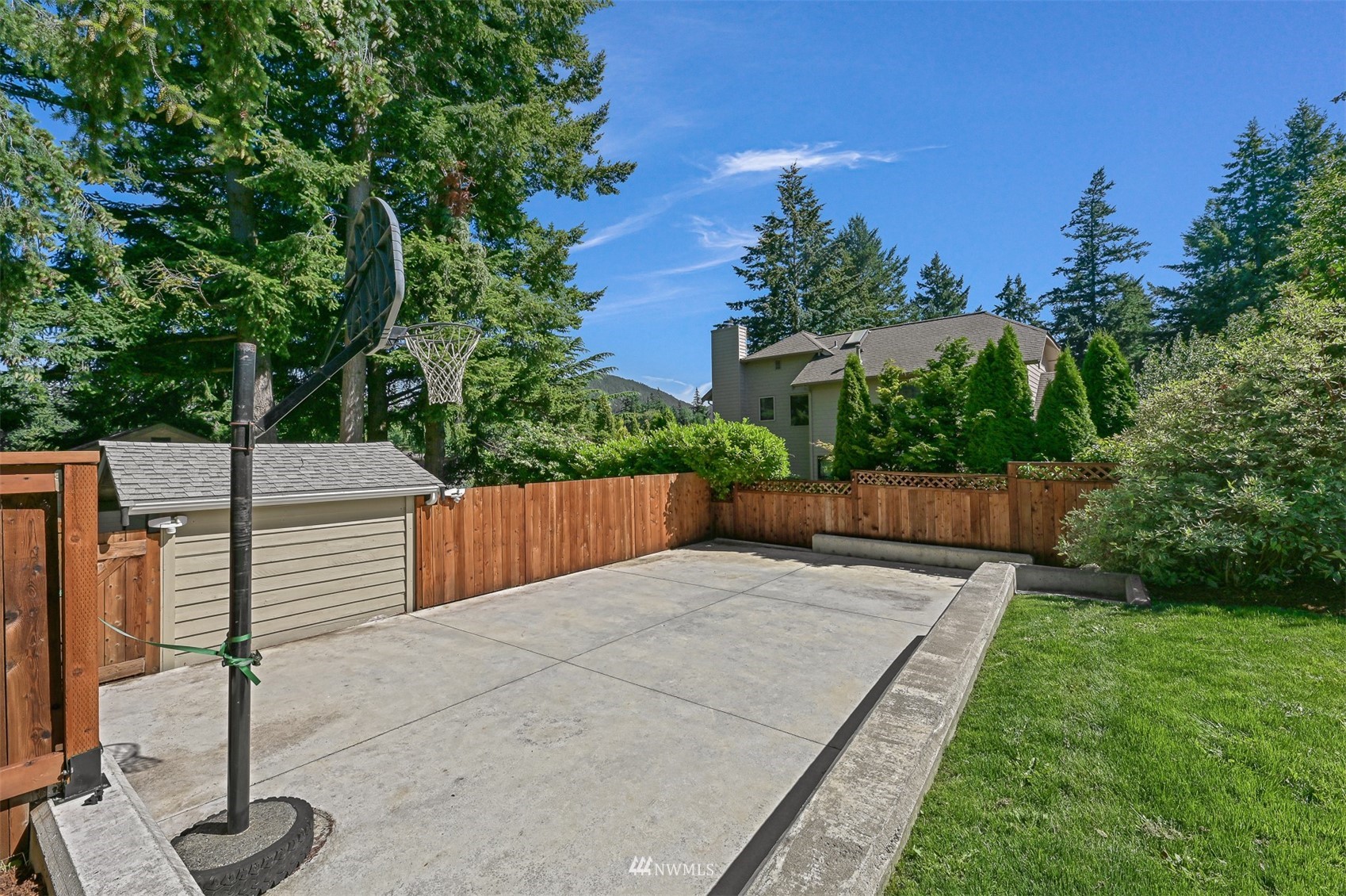 622 Everglade Road Bellingham, WA 98225 - Photo 28 of 38 a view of a backyard with wooden fence