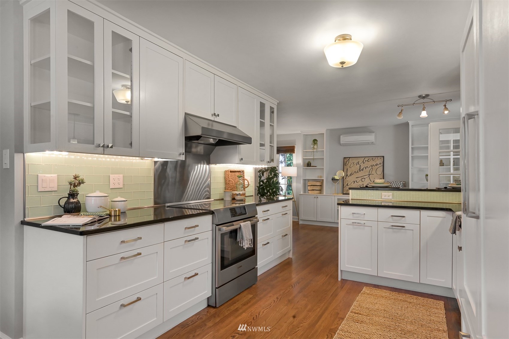 622 Everglade Road Bellingham, WA 98225 - Photo 6 of 38 a kitchen with stainless steel appliances granite countertop a sink and cabinets