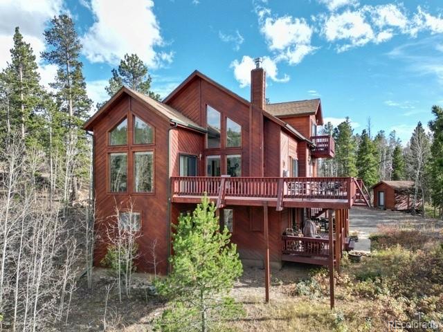 660 Coyote Circle Black Hawk, CO 80422 - Photo 2 of 46 a view of a house with a chairs balcony