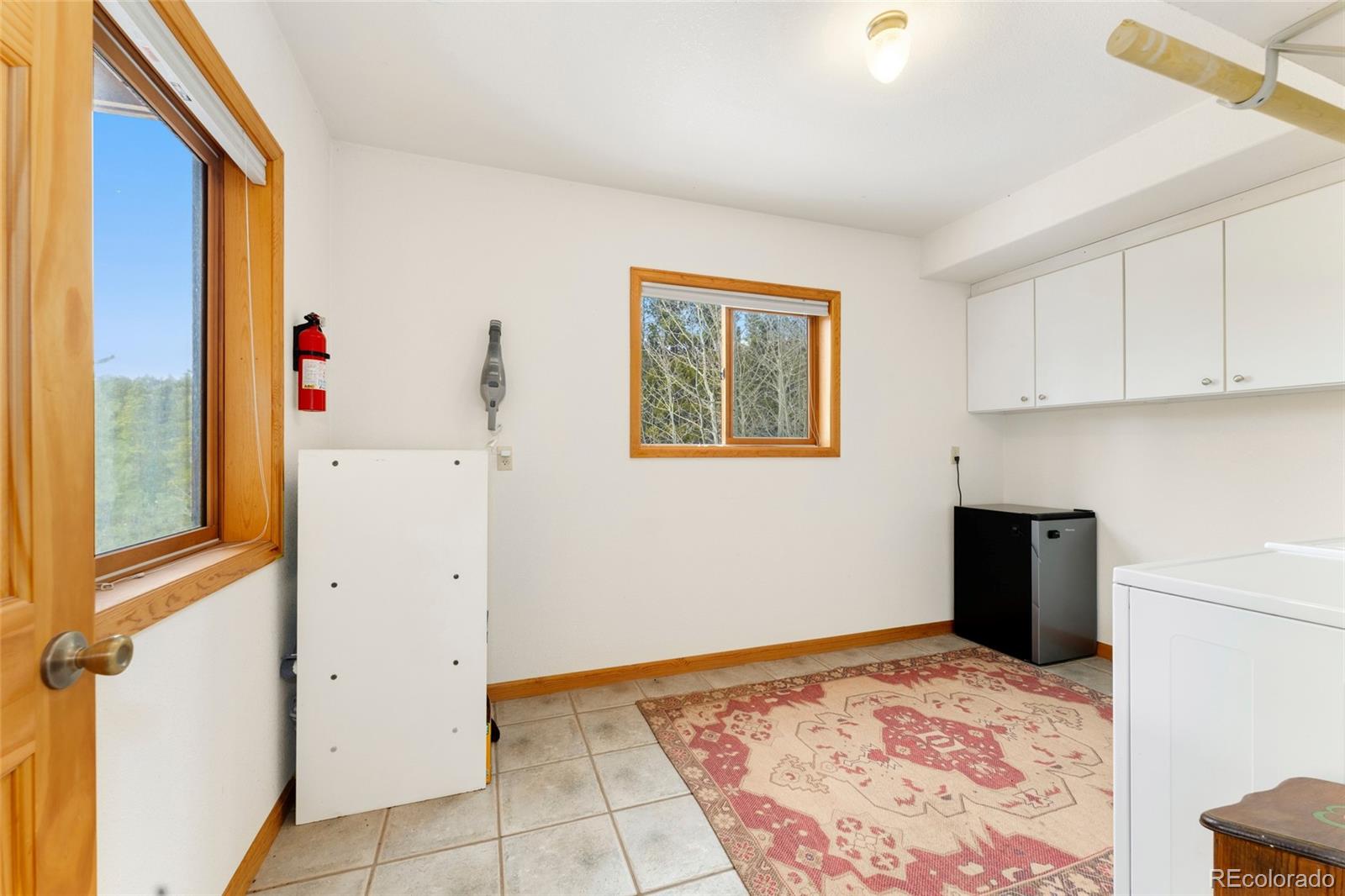 660 Coyote Circle Black Hawk, CO 80422 - Photo 30 of 46 a bedroom with a bed and a window