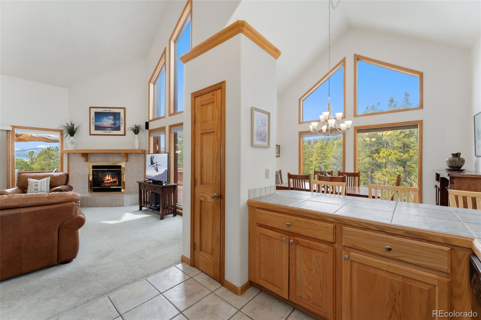 660 Coyote Circle Black Hawk, CO 80422 - Photo 10 of 46 a kitchen with sink cabinets and window