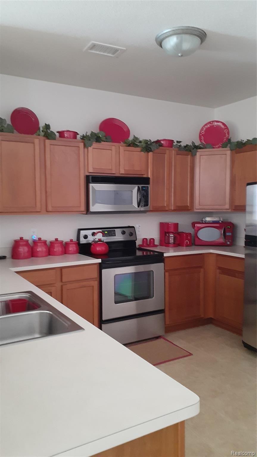 23438 Ridgeview Street, Unit 5 Taylor, MI 48180 - Photo 7 of 13 Another view of Kitchen