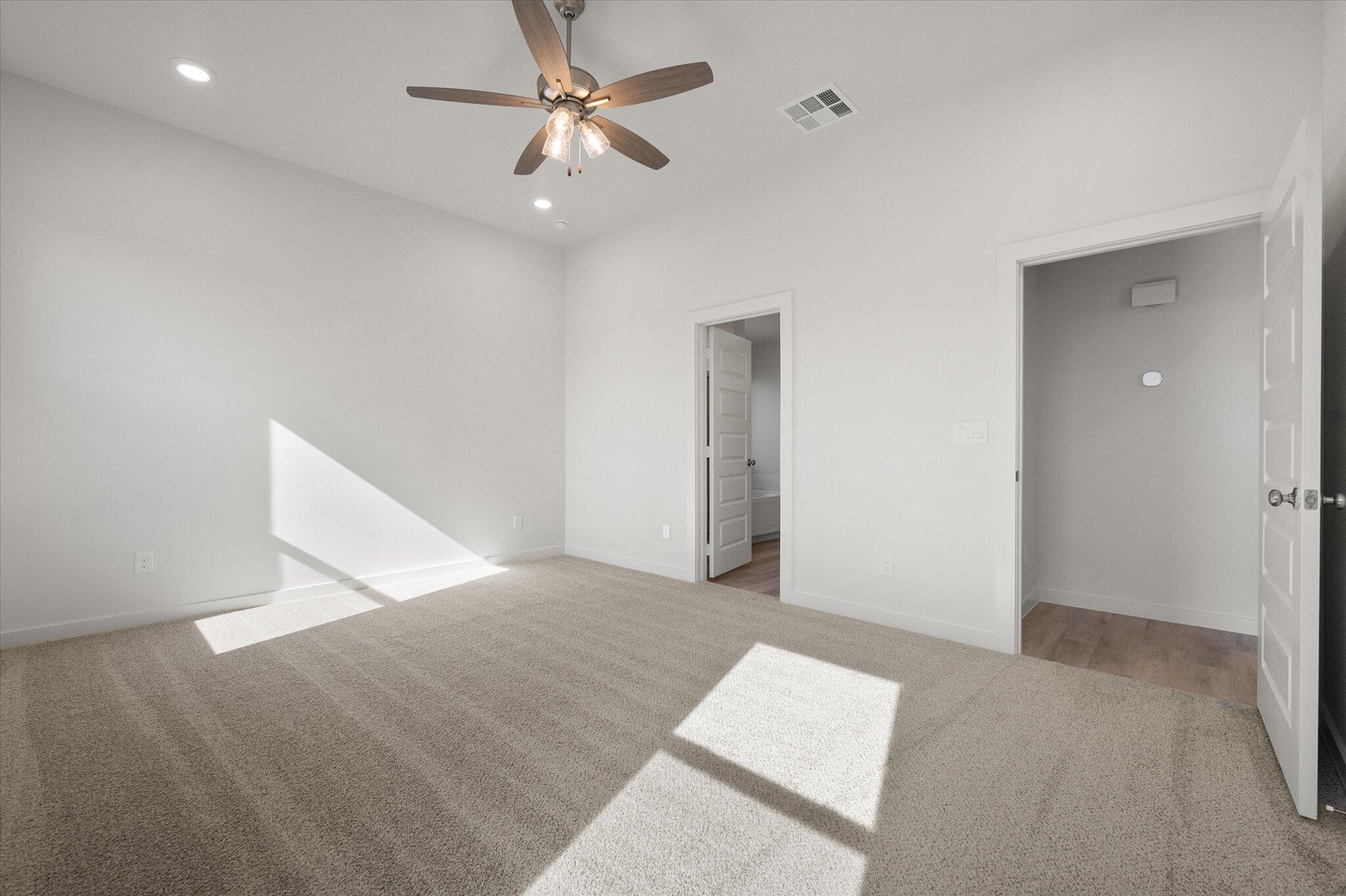 3003 138th Place Lubbock, TX 79423 - Photo 12 of 21 a view of an empty room with a window