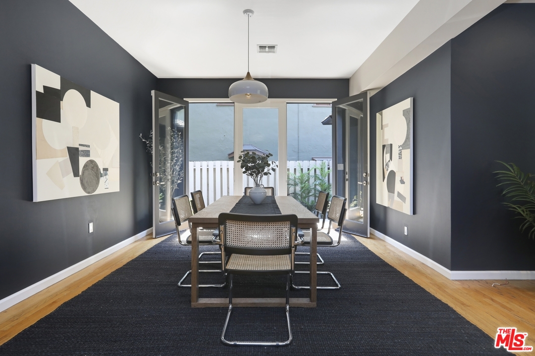 4357 Cedarhurst Circle Los Angeles, CA 90027 - Photo 12 of 51 a view of a dining room with furniture window and wooden floor