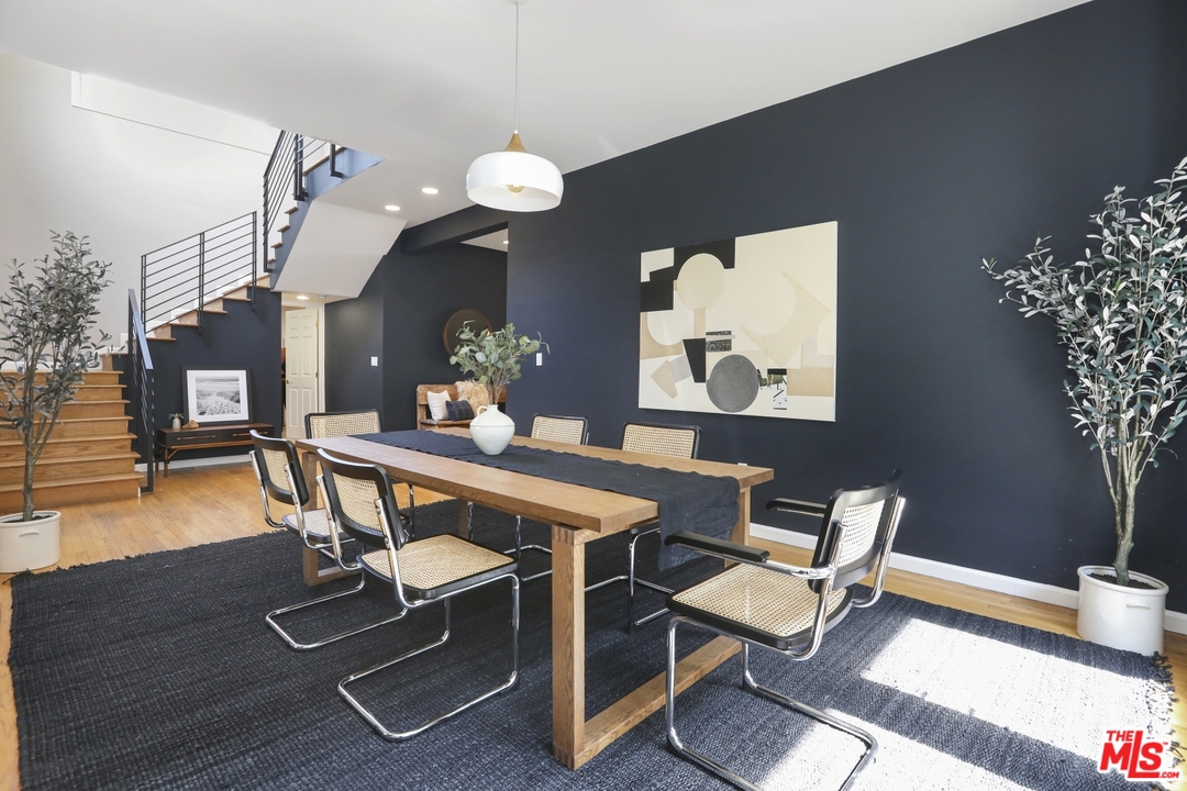 4357 Cedarhurst Circle Los Angeles, CA 90027 - Photo 14 of 51 a view of a dining room with furniture and wooden floor