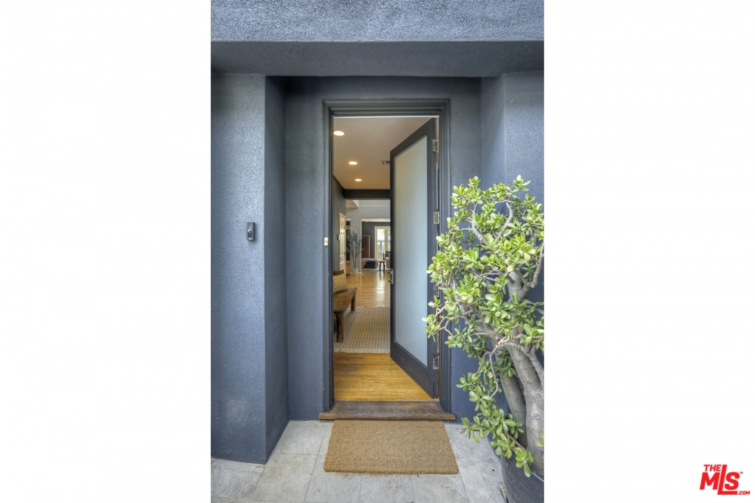4357 Cedarhurst Circle Los Angeles, CA 90027 - Photo 3 of 51 a bathroom with a sink and a mirror
