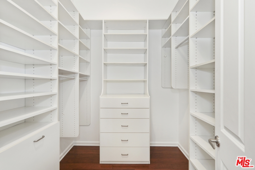 4357 Cedarhurst Circle Los Angeles, CA 90027 - Photo 33 of 51 a view of walk in closet with empty racks