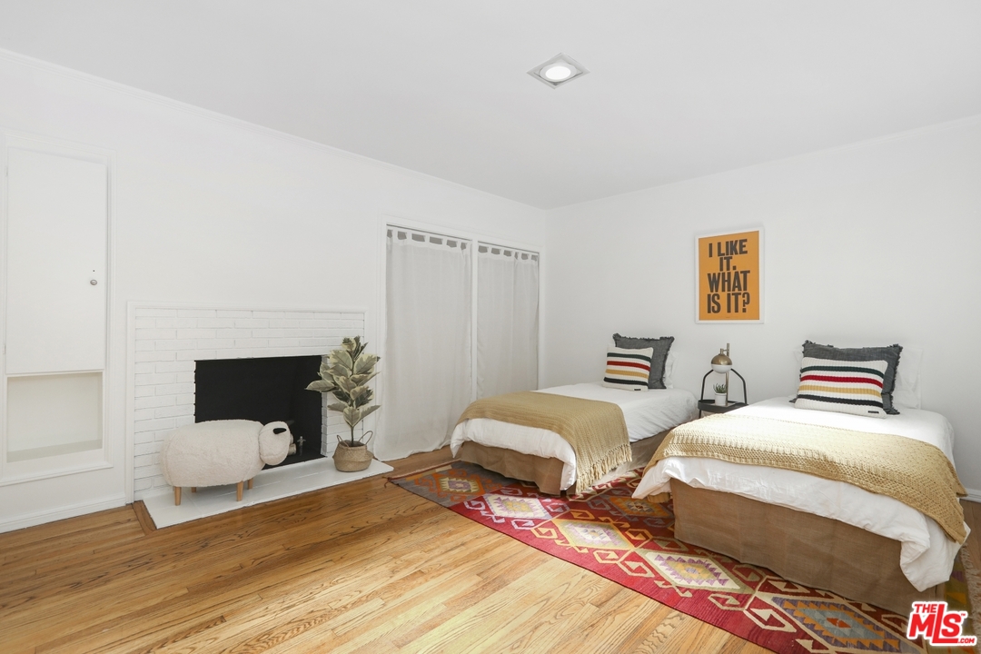 4357 Cedarhurst Circle Los Angeles, CA 90027 - Photo 38 of 51 a bedroom with two bed and a couch