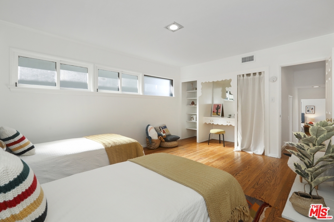 4357 Cedarhurst Circle Los Angeles, CA 90027 - Photo 39 of 51 a bedroom with a bed and a closet