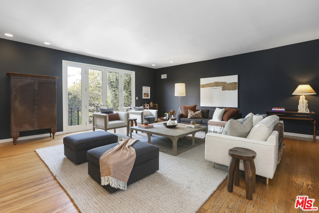 4357 Cedarhurst Circle Los Angeles, CA 90027 - Photo 8 of 51 a living room with furniture and a large window