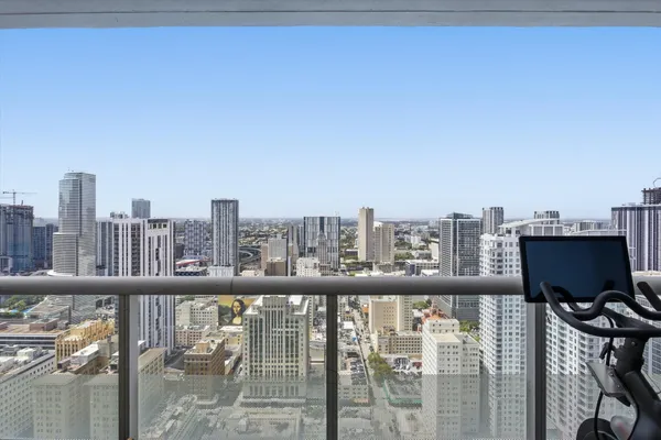a view of a city skyline from a balcony