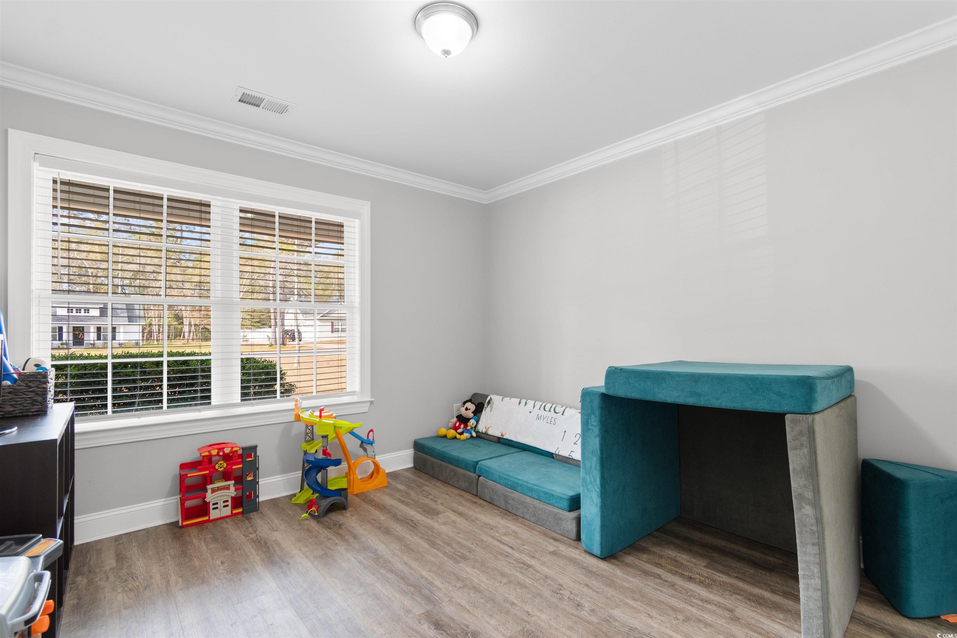 1275 Pinetucky Drive Galivants Ferry, SC 29544 - Photo 22 of 39 Recreation room with crown molding and light wood-style flooring