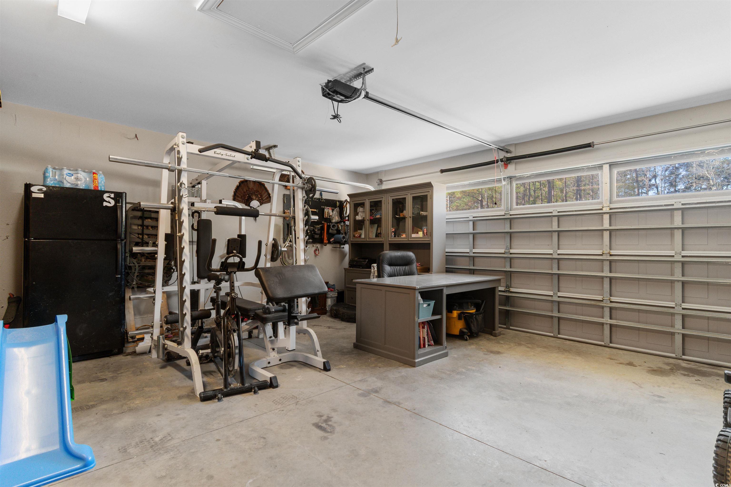 1275 Pinetucky Drive Galivants Ferry, SC 29544 - Photo 29 of 39 Garage with freestanding refrigerator