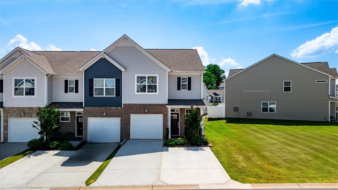 453 Bee Cv Way Pendleton, SC 29670 - Photo 1 of 25 End-unit townhome in The Falls at Meehan offering extra light throughout.