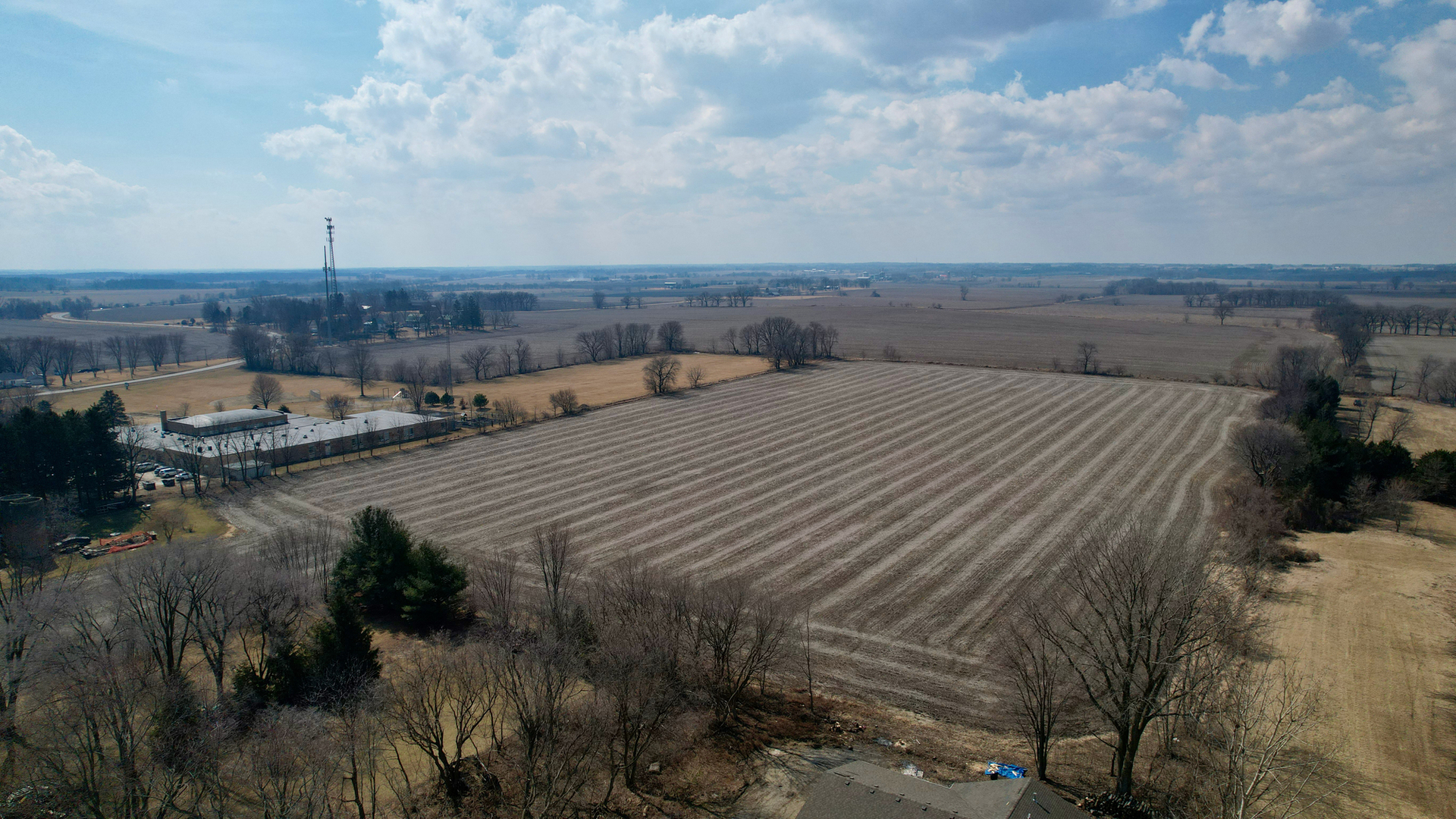 0 North Wooster Street Capron, IL 61012 - Photo 3 of 5 a view of a backyard of the house