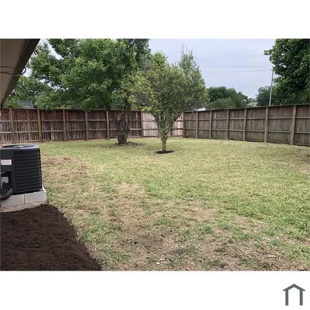 a black and white photo of a garden