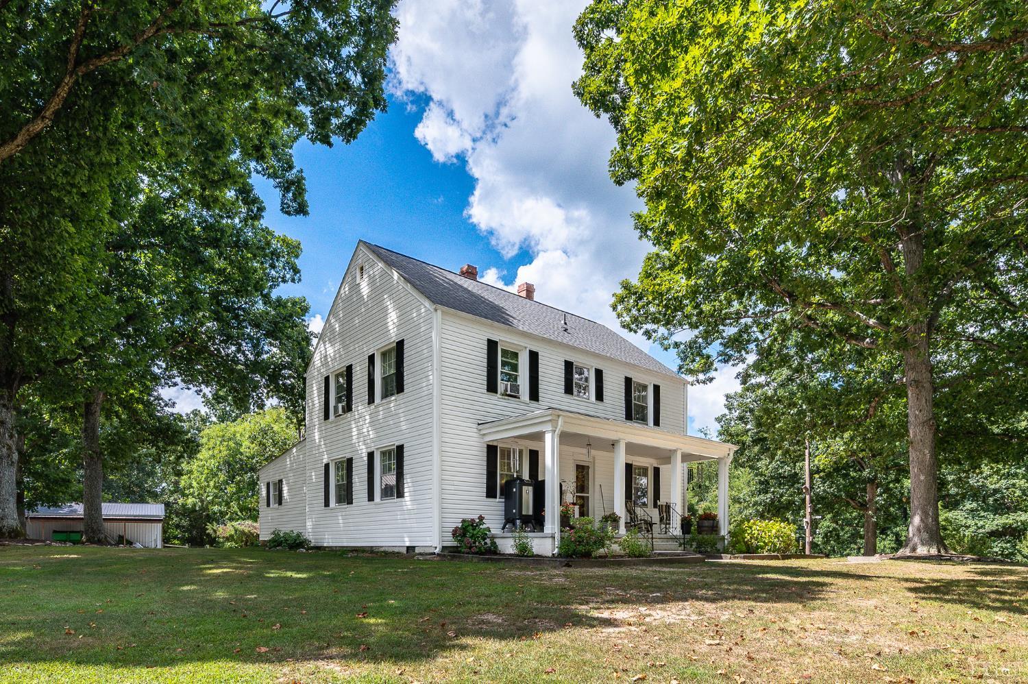 5 South Fork Road Pamplin, VA 23958 - Photo 2 of 5 a front view of a house with a garden