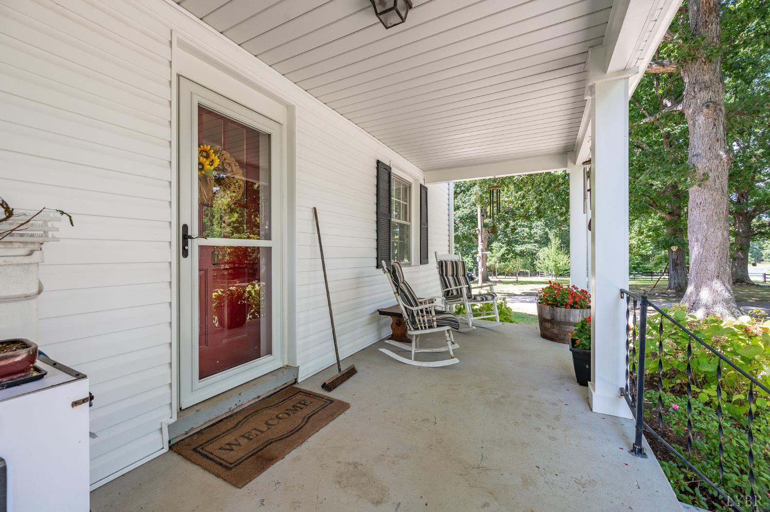 5 South Fork Road Pamplin, VA 23958 - Photo 5 of 5 a view of a patio with table and chairs and potted plants