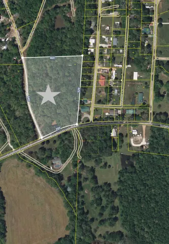 an aerial view of residential house with outdoor space