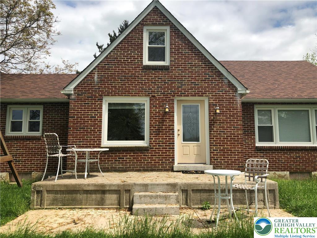 a front view of a house with balcony