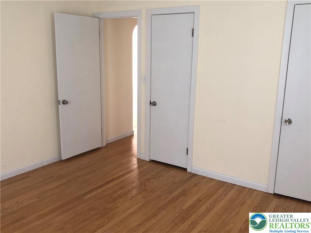 1931 Meadows Road Hellertown, PA 18055 - Photo 17 of 20 a view of an empty room with wooden floor