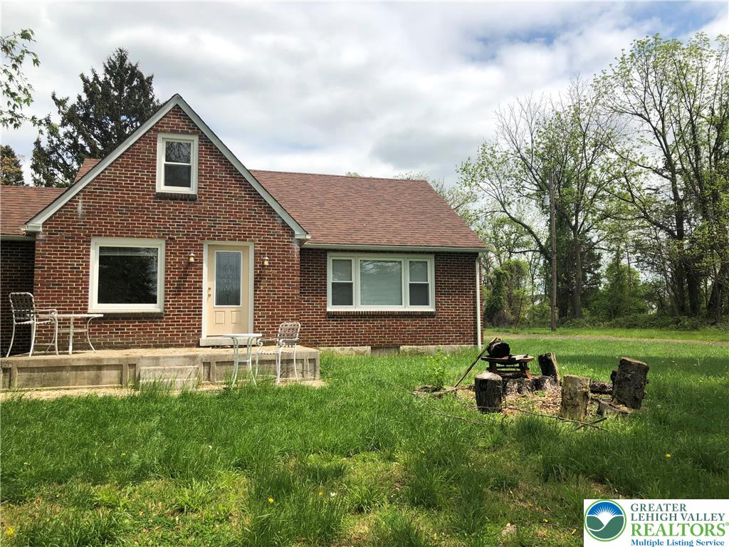 1931 Meadows Road Hellertown, PA 18055 - Photo 2 of 20 a front view of house with yard and green space