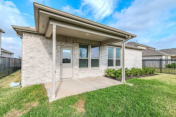a house view with a garden space