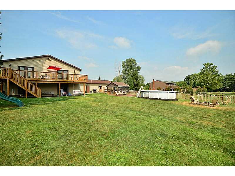 932 Mcelhaney Road Freedom, PA 15042 - Photo 23 of 25 Yard/Garden. The expansive view of this entertainer s dream! Pool, 36x12 deck, 36x12 patio, kids playset and screened pool house for storage!