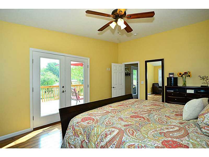 932 Mcelhaney Road Freedom, PA 15042 - Photo 9 of 25 Master Bedroom. French doors open to a large deck to enjoy your morning or evening beverage.