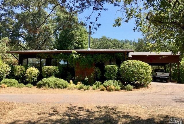23853 Eastside Road Willits, CA 95490 - Photo 1 of 1 an outdoor view of garden with lake view