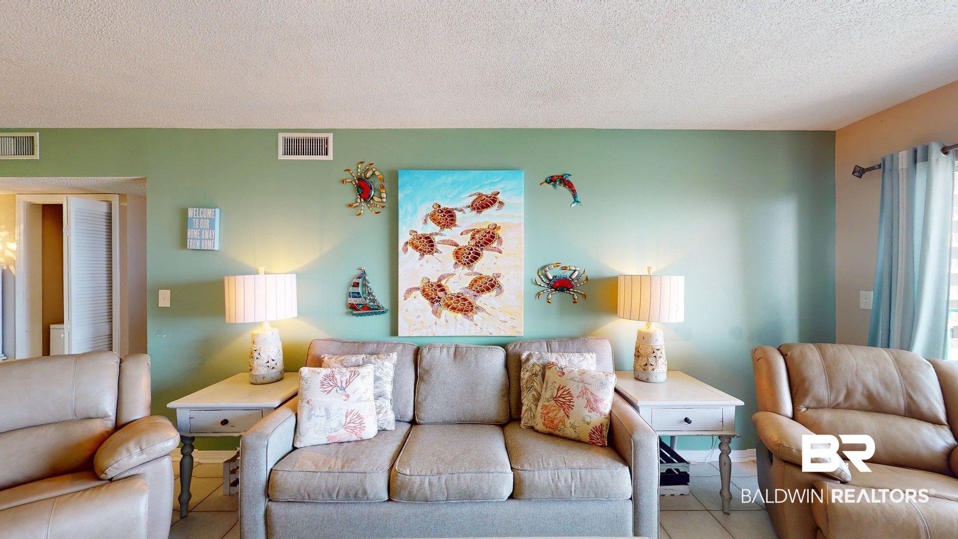 645 Plantation Road, Unit 6503 Gulf Shores, AL 36542 - Photo 17 of 53 Living room featuring tile patterned floors and a textured ceiling