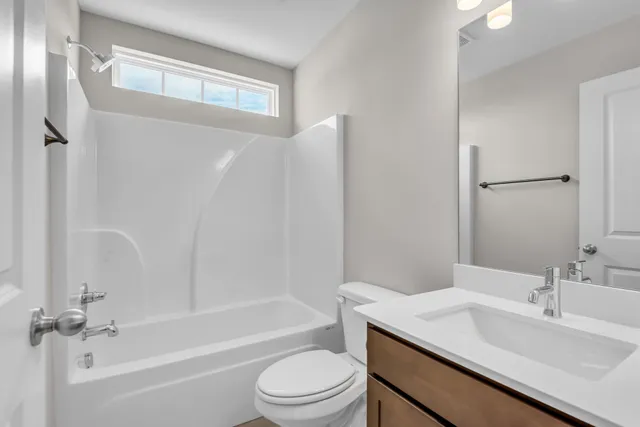 a bathroom with a sink toilet and a bathtub