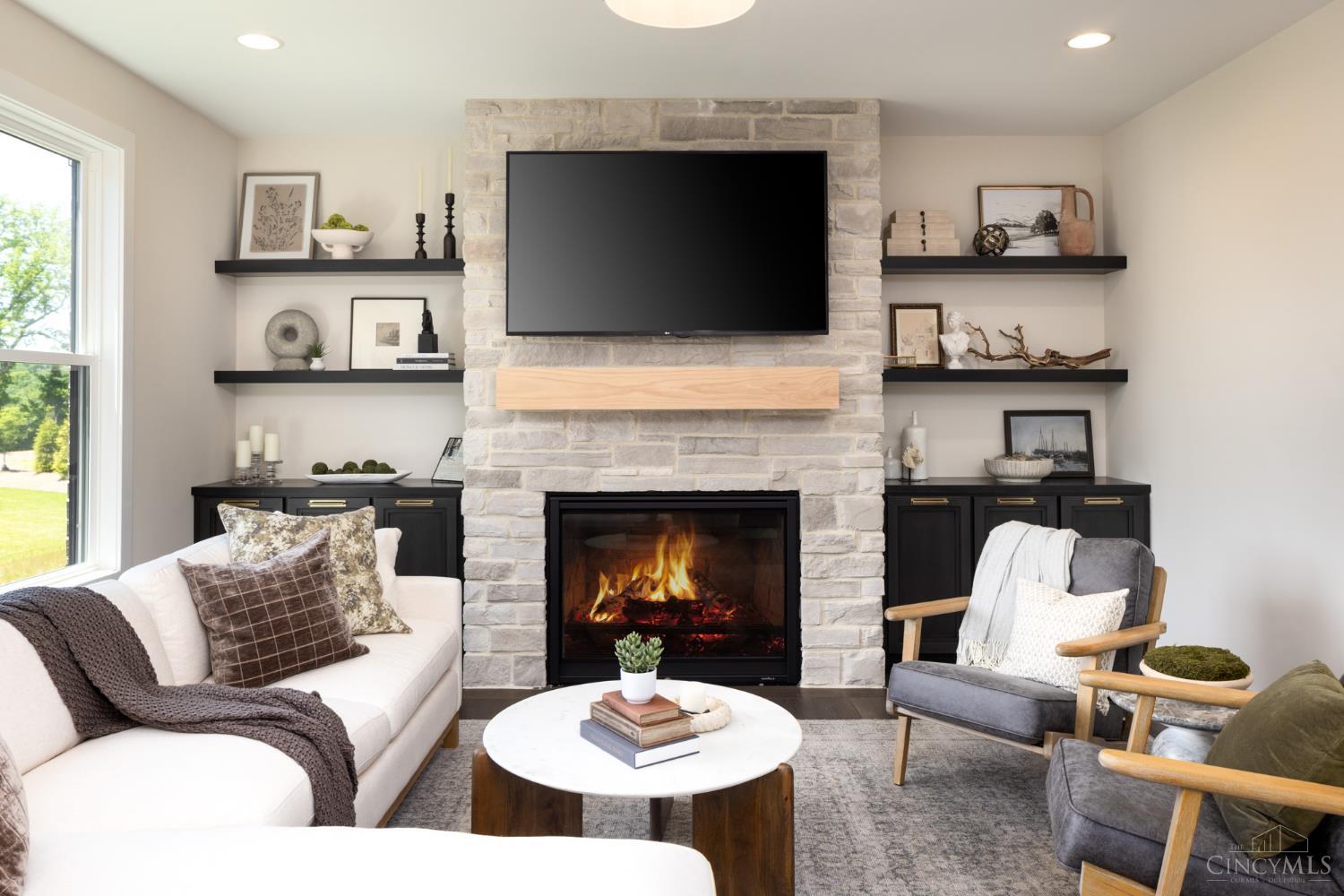 6984 Shadow Ridge Road Cincinnati, OH 45230 - Photo 5 of 22 Great Room with Gas Fireplace & Shelving