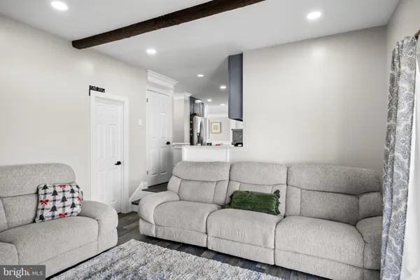 a living room with furniture and a couch
