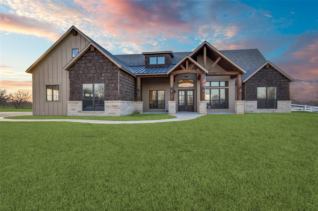 5165 Hartlee Field Road Denton, TX 76208 - Photo 1 of 39 a front view of house with yard and green space