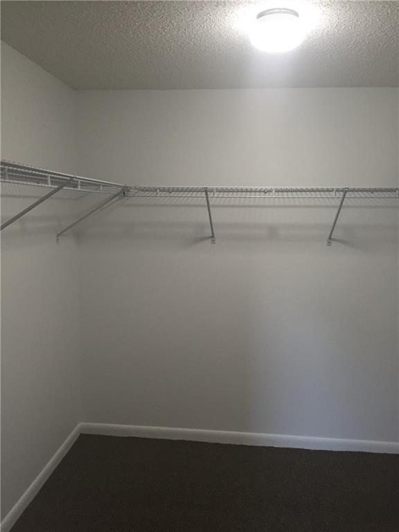 3122 Southwest 20th Terrace, Unit 25B1 Delray Beach, FL 33445 - Photo 13 of 21 a view of small space with racks on the wall